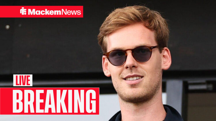 Sunderland owner Kyril Louis-Dreyfus smiles while wearing sunglasses.