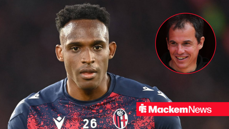 Sunderland manager Regis Le Bris smiling looking at Jhon Lucumi at Bologna