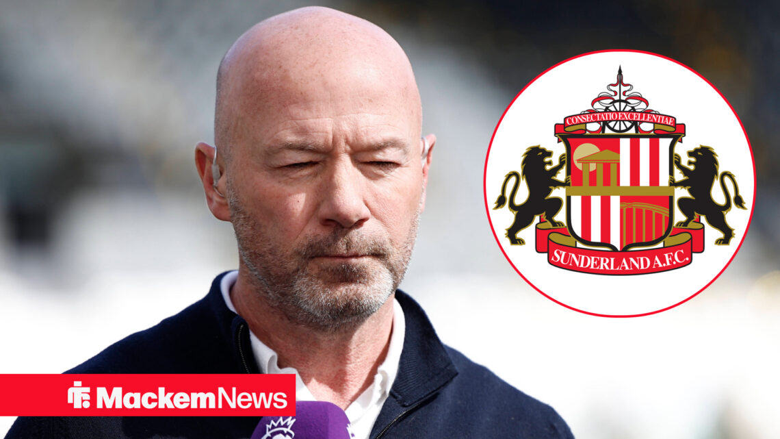 Alan Shearer looking at the Sunderland badge