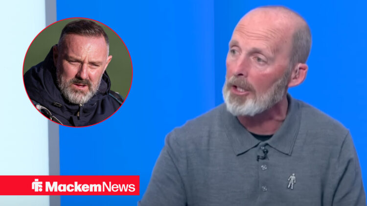 Mike Dean talking with Kris Boyd