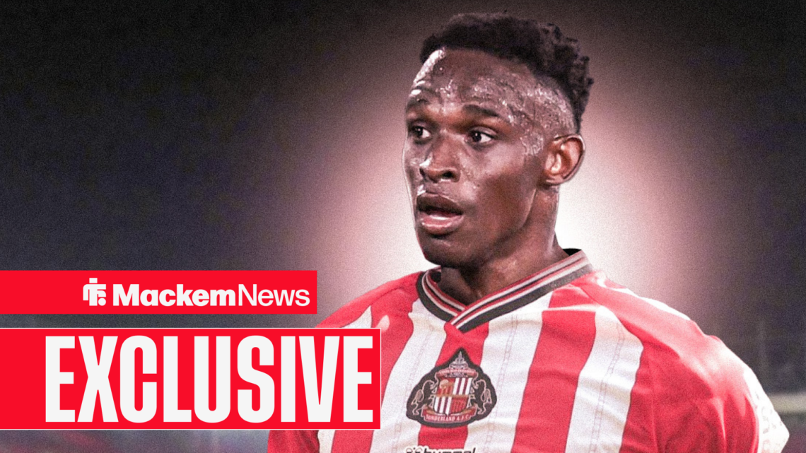 Bologna defender Jhon Lucumi in a Sunderland home shirt.
