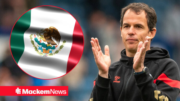 Regis Le Bris clapping with a flag of Mexico
