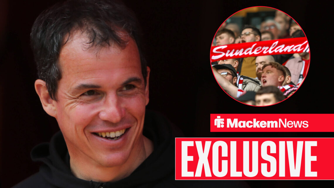 Sunderland manager Regis Le Bris smiling and Sunderland supporters.