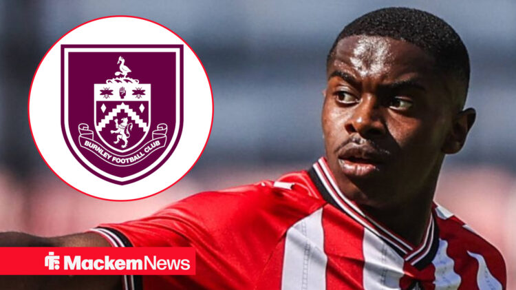 Noah Sadiki playing for Sunderland with Burnley badge