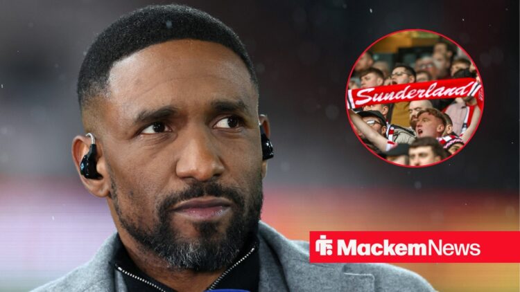 Jermain Defoe looking on with Sunderland fans in frame