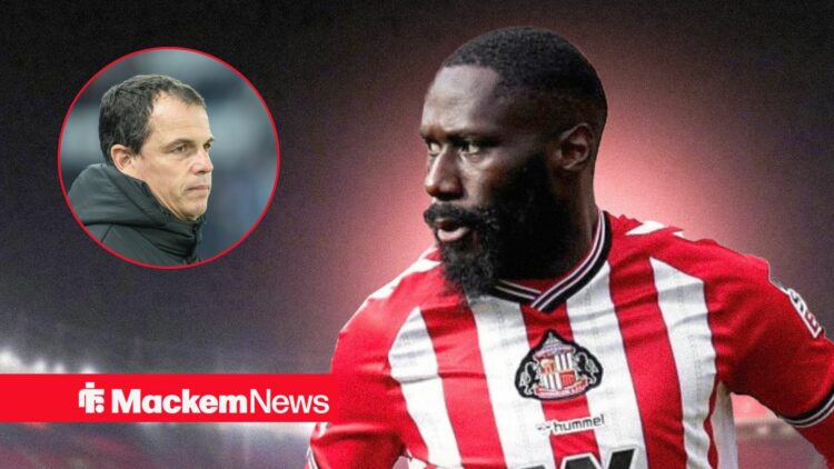 Arthur Masuaku in Sunderland shirt with Regis Le Bris in frame