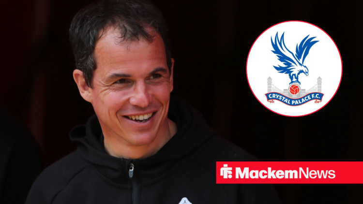 Regis Le Bris smiling with Crystal Palace badge in frame