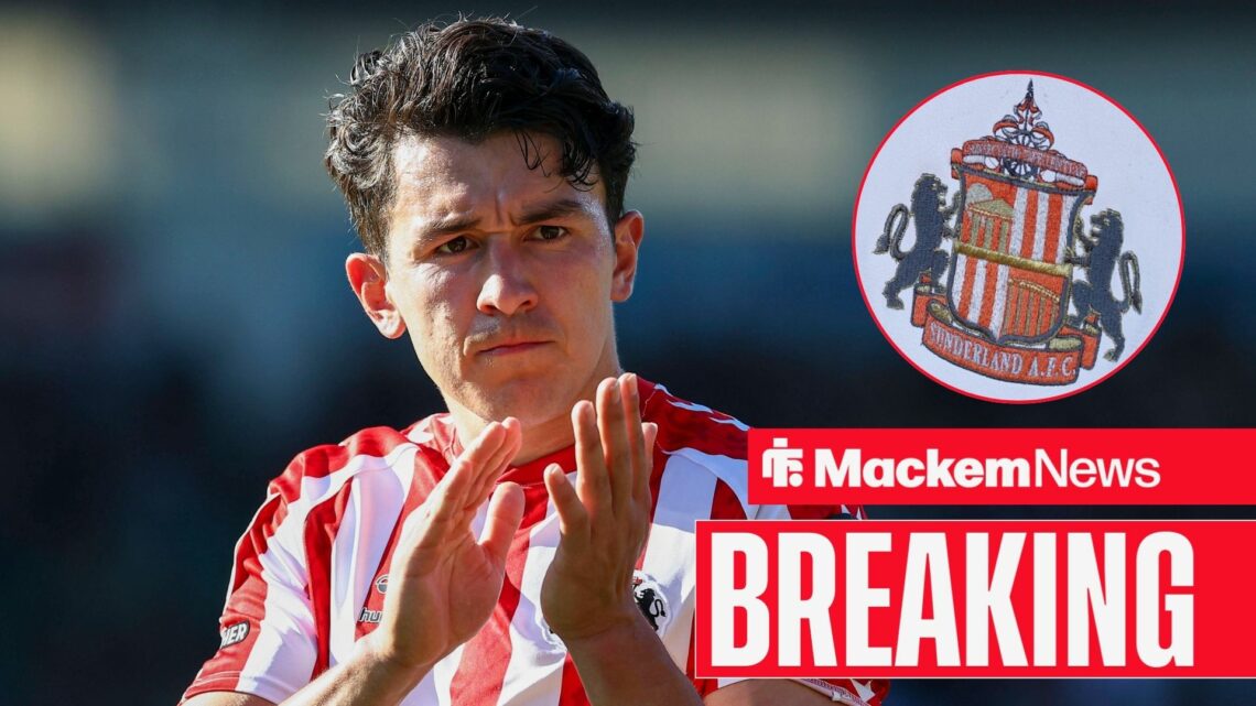 Sunderland's Luke O'Nien looks serious as claps. To his right is the Sunderland crest.