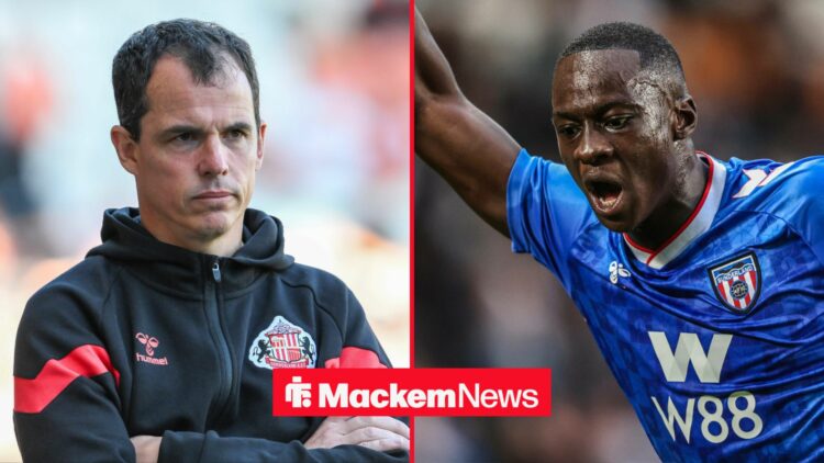 Regis Le Bris and Habib Diarra stood side-by-side