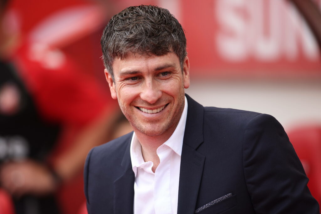 Florent Ghisolfi smiles at the Stadium of Light.