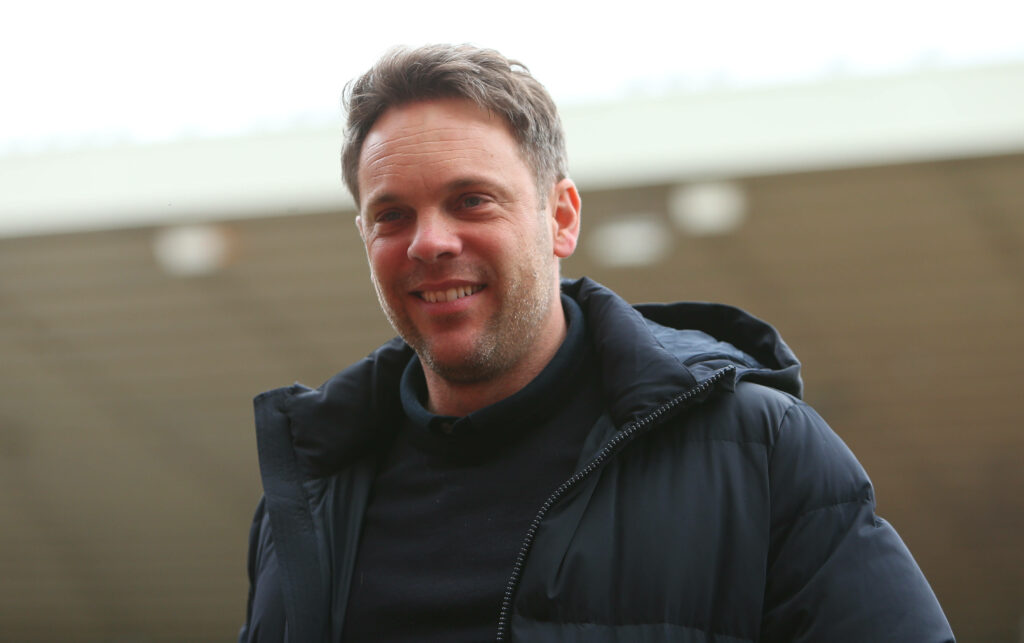 Kristjaan Speakman looks on smiling