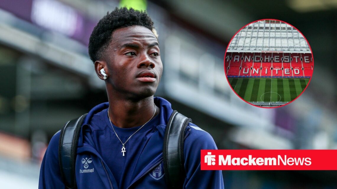 Simon Adingra looking on with Old Trafford in frame