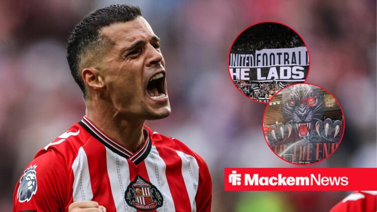 Granit Xhaka celebrating with Sunderland fans and Newcastle fans in frame