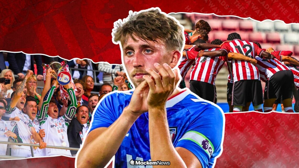Dan Neil appluading with Sunderland players in huddle