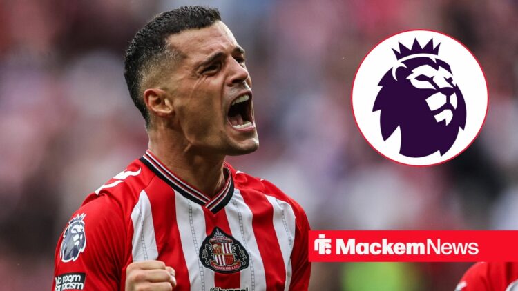 Granit Xhaka celebrating with the Premier League badge in frame.