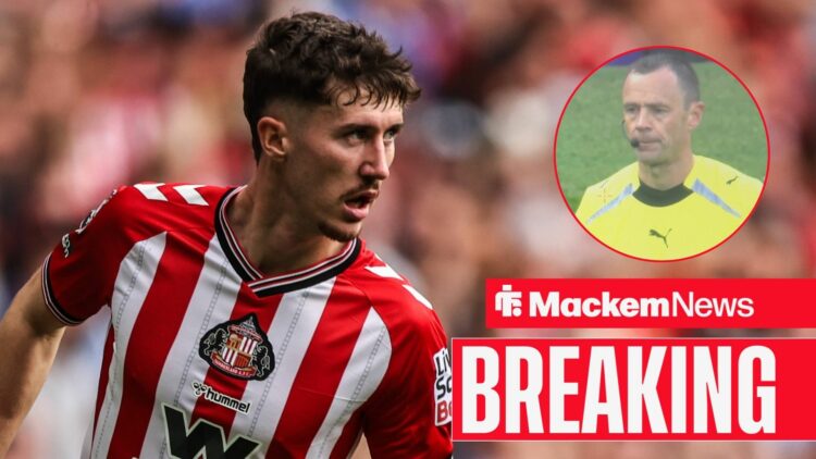 Trai Hume in action for Sunderland with Stuart Atwell in frame