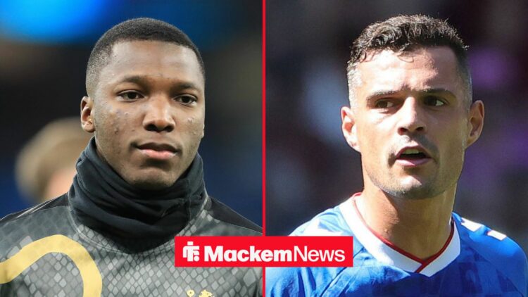 Sunderland midfielder Granit Xhaka with Chelsea midfielder Moises Caicedo