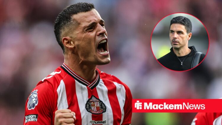 Granit Xhaka celebrating with Mikel Arteta in circle