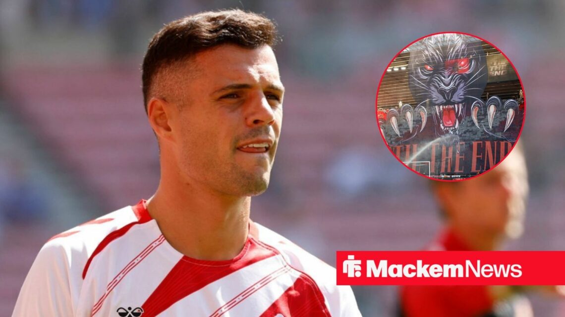 Granit Xhaka with Sunderland tifo in frame