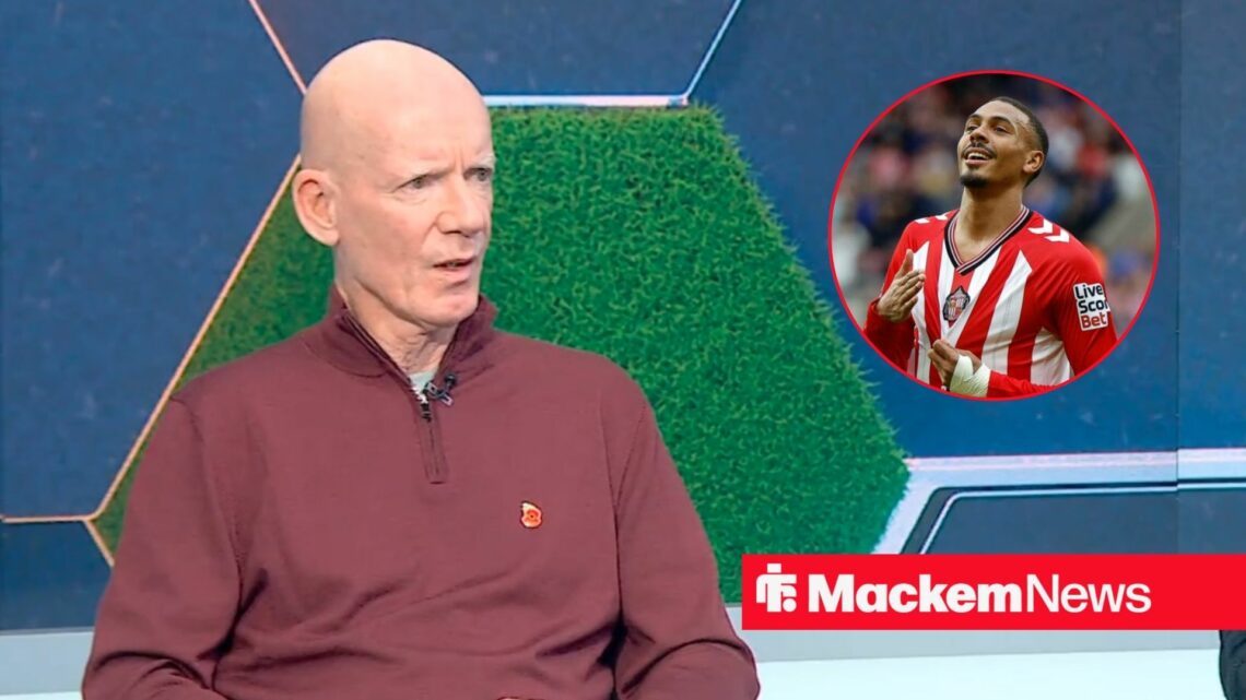 Dermot Gallagher looking on with Wilson Isidor in frame