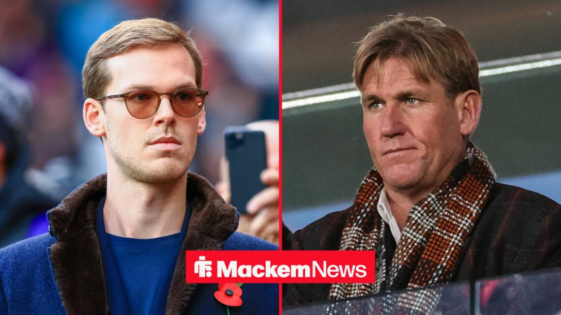 Simon Jordan and Kyril Louis-Dreyfus, looking at each other with a serious expression.