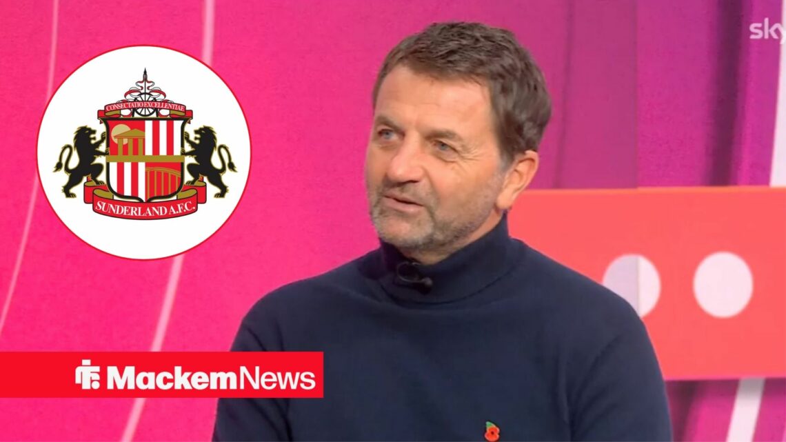 Tim Sherwood looking at the Sunderland badge.