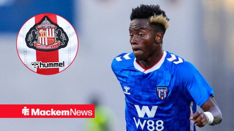 Simon Adingra with Sunderland badge in frame