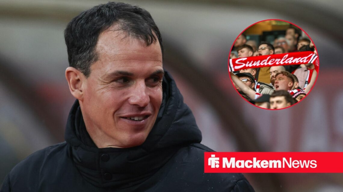 Regis Le Bris smiling with Sunderland fans in frame