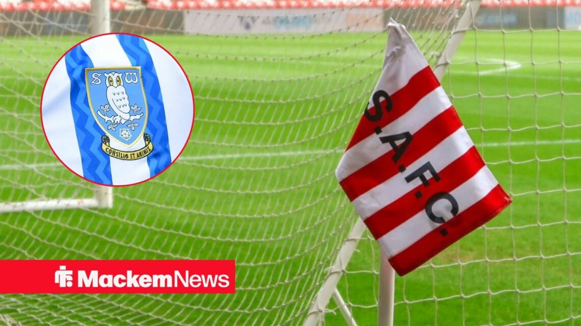 Sunderland corner flag with Sheff Wednesday badge in frame