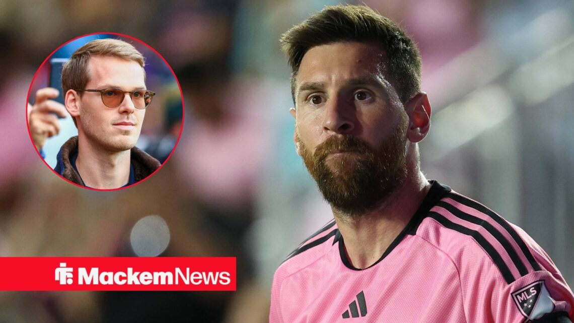 Kyril Louis-Dreyfus smiling in the direction of Lionel Messi.