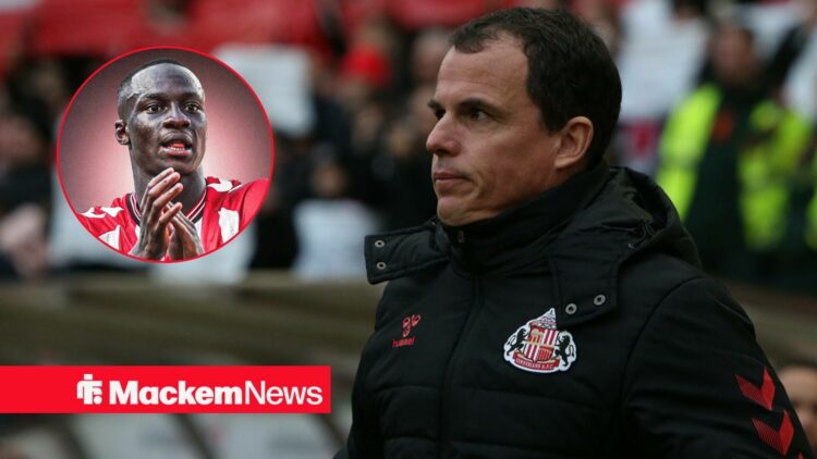 Regis Le Bris with Habib Diarra in frame