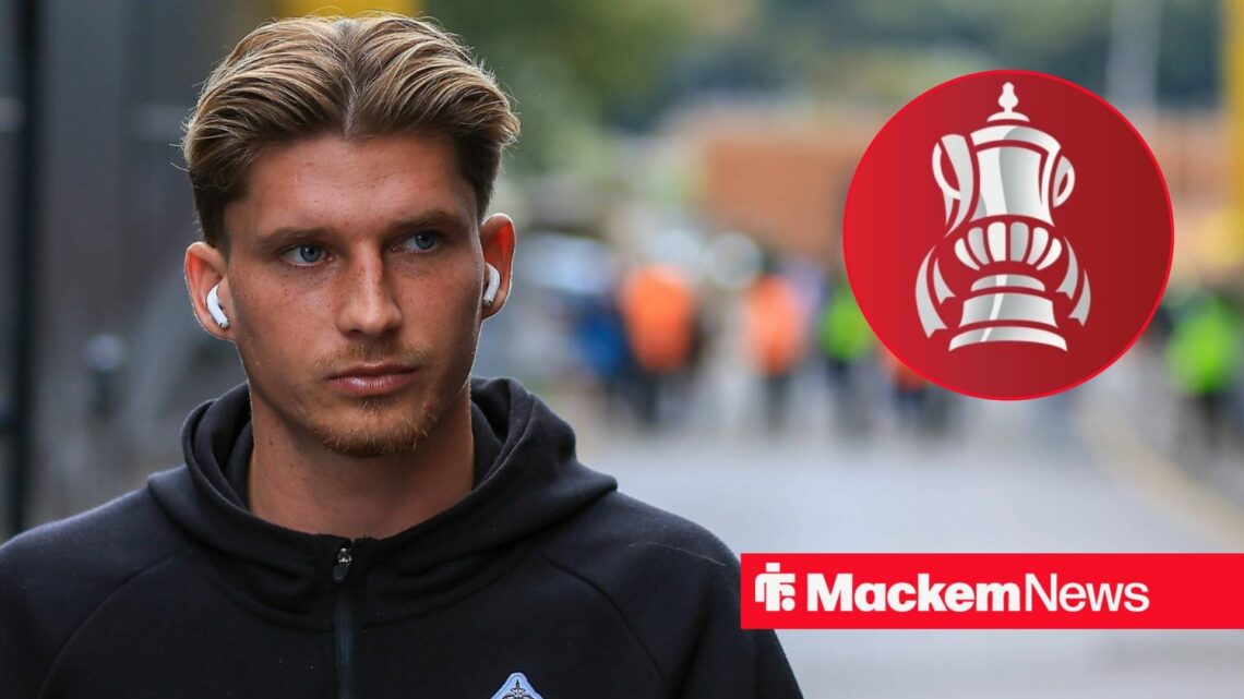 Sunderland's Dennis Cirkin pre-match with Emirates FA Cup logo in circular inset