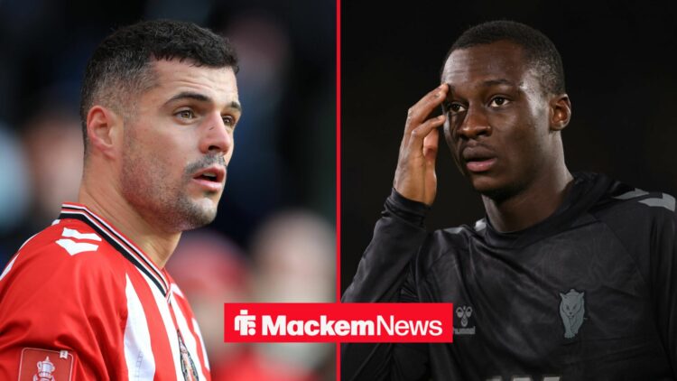 A dejected Sunderland midfielder Granit Xhaka looking across to his left, alongside Habib Diarra putting his hand to his head in a 50/50 split